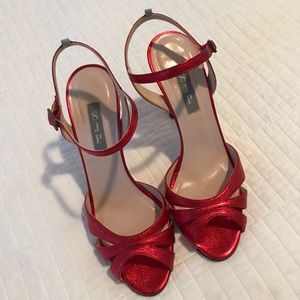 SJP red metallic pumps!